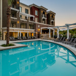 Adagio on the Green's apartment homes overlooking one of the two pools available in the property.